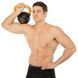Гиря тренировочная цельная обрезиненная с окрашенной ручкой LiveUp Urethane competition kettlebell UAZE5336-12 вес 12кг черный-оранжевый