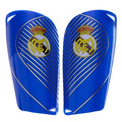 Щитки футбольные REAL MADRID SP-Sport FB-6850 (пластик, EVA, l-14х8см, р-р S-L, цвета в ассортименте)